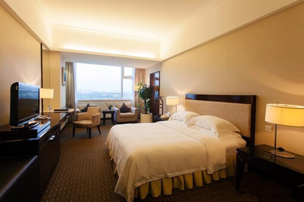 Tienyow Grand Hotel Haikou  Δωμάτιο φωτογραφία