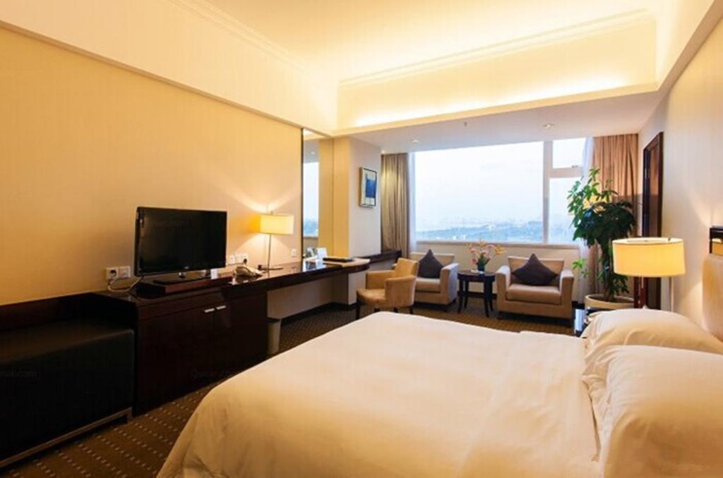 Tienyow Grand Hotel Haikou  Δωμάτιο φωτογραφία