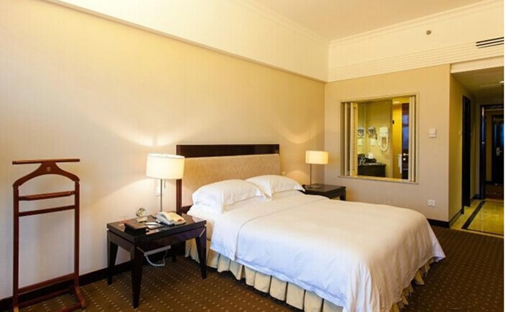 Tienyow Grand Hotel Haikou  Δωμάτιο φωτογραφία