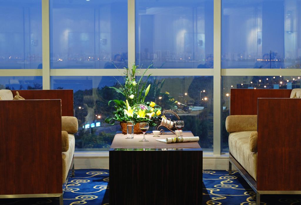 Tienyow Grand Hotel Haikou  Δωμάτιο φωτογραφία