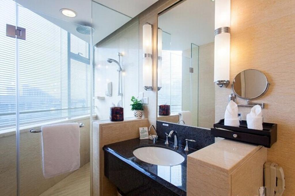 Tienyow Grand Hotel Haikou  Δωμάτιο φωτογραφία